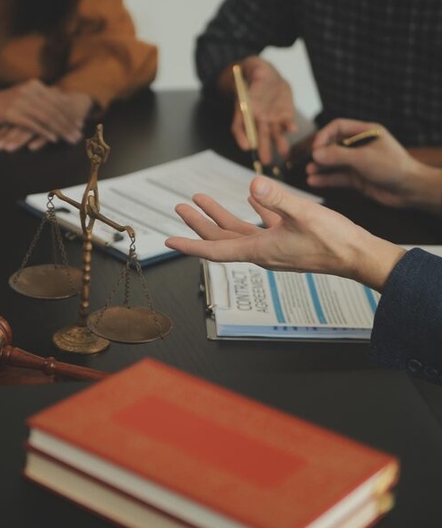 justice-law-concept-legal-counsel-presents-client-signed-contract